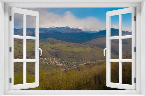 Fototapeta Naklejka Na Ścianę Okno 3D - small village landscape in the mountains in spring panorama