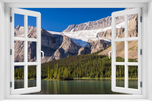Fototapeta Naklejka Na Ścianę Okno 3D - Crowfoot Glacier reflects on Bow Lake in Banff National Park