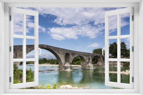 Fototapeta Naklejka Na Ścianę Okno 3D - The Bridge of Arta is an old stone bridge that crosses the Arach