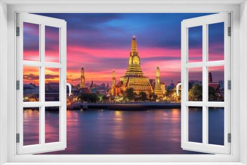 Wat Arun temple Bangkok during sunset in Thailand. Chao praya river