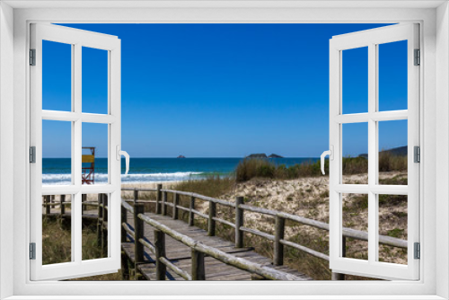 Fototapeta Naklejka Na Ścianę Okno 3D - Chegando na praia