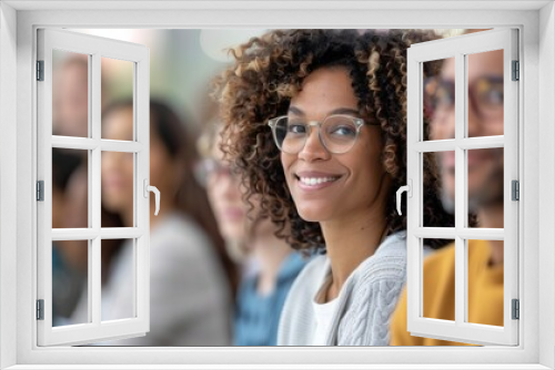 Smiling Attendees in a Workshop Setting During Daylight Hours