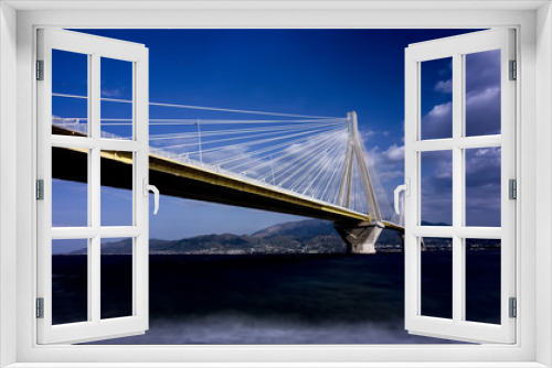 Fototapeta Naklejka Na Ścianę Okno 3D - Suspension bridge crossing Corinth Gulf strait, Greece. Is the w