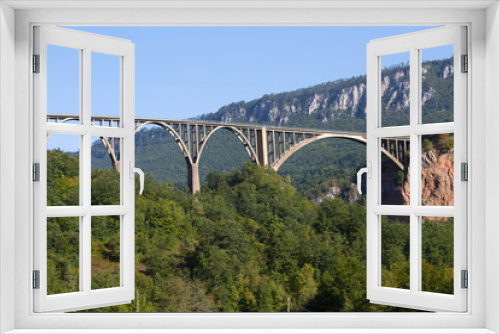 Fototapeta Naklejka Na Ścianę Okno 3D - Bridge is a concrete arch bridge over the Tara River in northern Montenegro