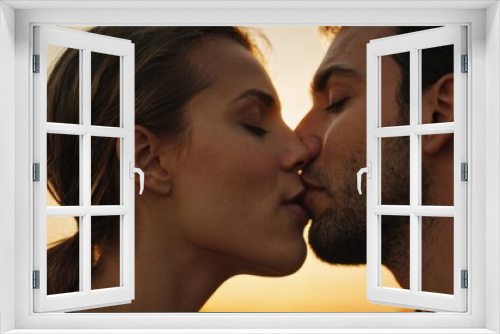 Romantic Sunset Kiss: A Couple Embracing on the Beach