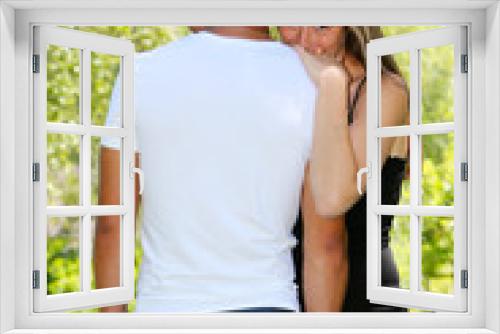 Mixed young couple in a park