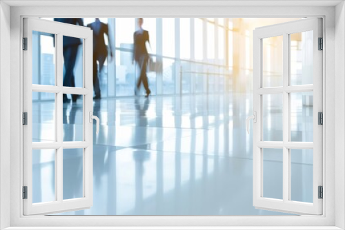 Corporate Professionals Walking in Modern Office Building at Sunrise