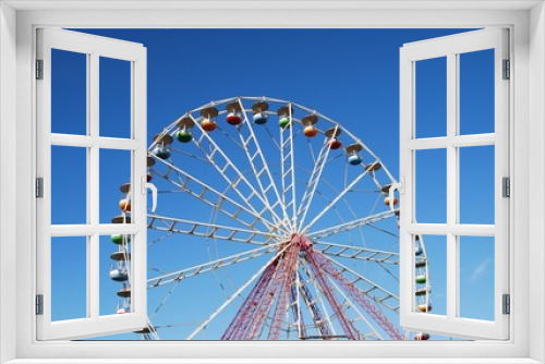 Fototapeta Naklejka Na Ścianę Okno 3D - Ferris wheel on background blue sky