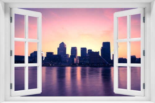 Fototapeta Naklejka Na Ścianę Okno 3D - Canary Wharf modern buildings in London on river Thames