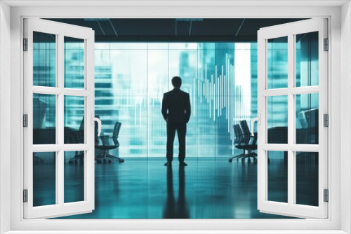 Businessman Looking at Data on a Large Screen in an Office