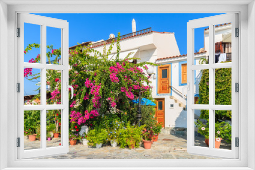 Fototapeta Naklejka Na Ścianę Okno 3D - Traditional Greek house with bougainvillea flowers in Kokkari town, Samos island, Greece