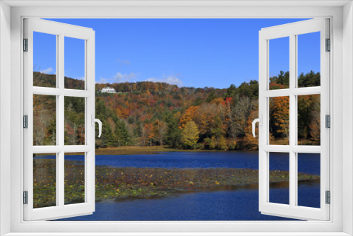 Fototapeta Naklejka Na Ścianę Okno 3D - Cone Manor House near Blowing Rock, NC  in the distance with Bass Lake in the foreground