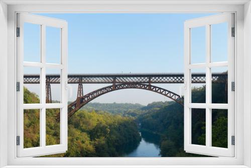 Fototapeta Naklejka Na Ścianę Okno 3D - Iron bridge over the river Adda Lecco Italy