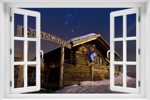 Fototapeta Naklejka Na Ścianę Okno 3D - Night shot of a wooden shack in winter