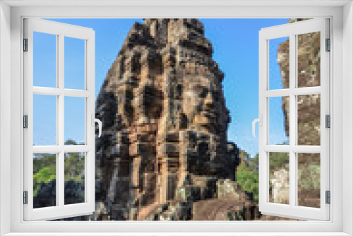 Fototapeta Naklejka Na Ścianę Okno 3D - Faces in Bayon Temple