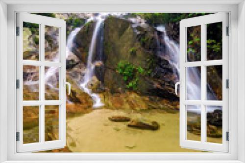 Fototapeta Naklejka Na Ścianę Okno 3D - Beautiful cascading waterfall in tropical forest