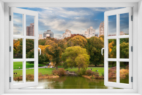 Fototapeta Naklejka Na Ścianę Okno 3D - New York City Manhattan Central Park panorama with autumn lake with skyscrapers and colorful trees..