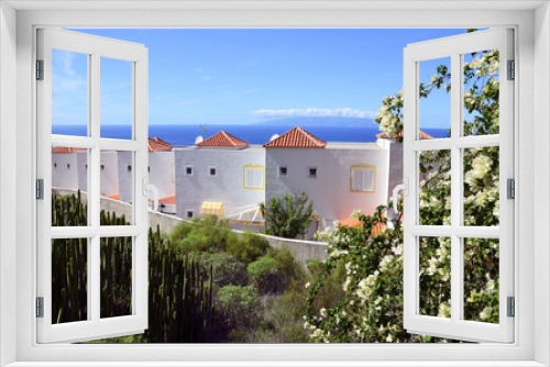 Fototapeta Naklejka Na Ścianę Okno 3D - Beautiful view of Torviscas Alto with tropical plants,Tenerife,Canary Islands.
