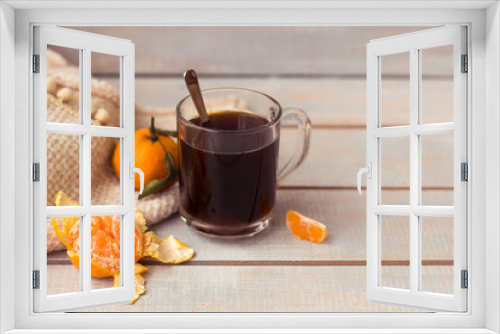Fototapeta Naklejka Na Ścianę Okno 3D - Aromatic coffee, tangerine on a white wooden background.