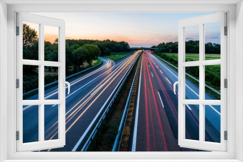 Fototapeta Naklejka Na Ścianę Okno 3D - Sunset long-exposure over a german highway