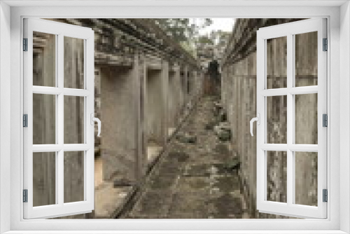 Fototapeta Naklejka Na Ścianę Okno 3D - Ancient walls at Angkor Wat complex, Cambodia.