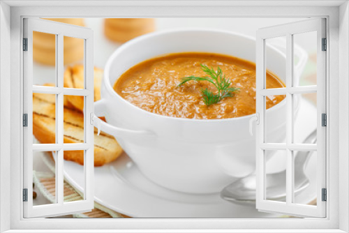 Fototapeta Naklejka Na Ścianę Okno 3D - Lentil cream soup with toasts on white table