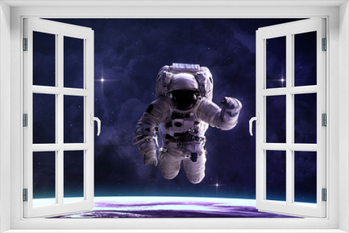 Fototapeta Naklejka Na Ścianę Okno 3D - Astronaut in outer space. Elements of this image furnished by NASA