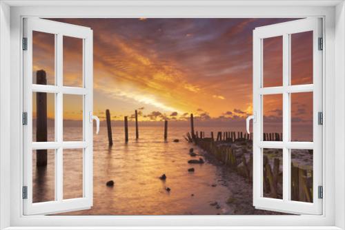 Fototapeta Naklejka Na Ścianę Okno 3D - Sunrise over sea on the island of Texel, The Netherlands
