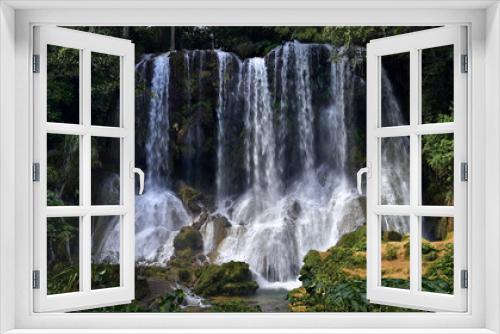 Fototapeta Naklejka Na Ścianę Okno 3D - Waterfall in a lush rainforest. Beautiful waterfalls or cascades in El Nicho, El Nicho waterfall, in Scambray mountains. Cienfuegos province, Cuba.