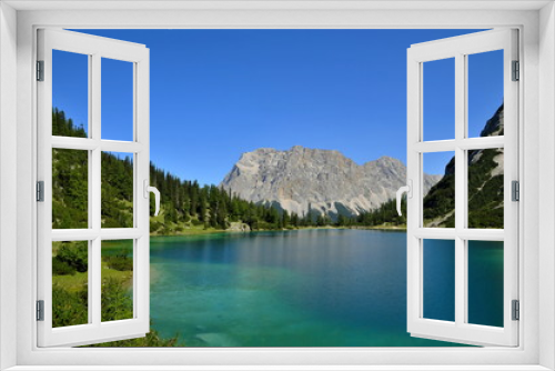 Fototapeta Naklejka Na Ścianę Okno 3D - Bergsee in Tirol, Österreich mit Blick auf Bergmassiv
