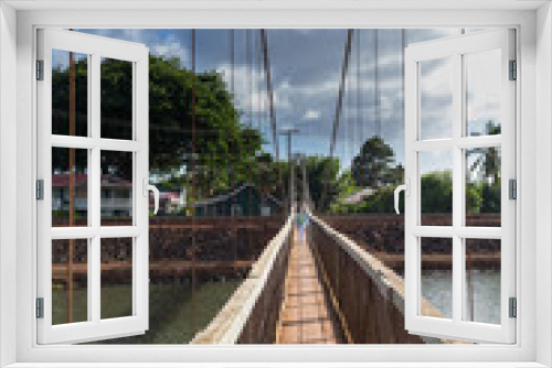 Fototapeta Naklejka Na Ścianę Okno 3D - View down the famous swinging bridge in Hanapepe Kauai