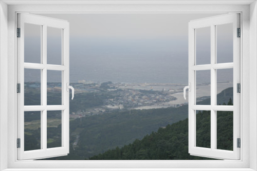 Fototapeta Naklejka Na Ścianę Okno 3D - A view of town in Yakushima