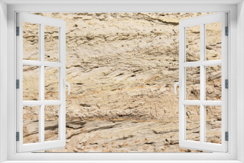 Fototapeta Naklejka Na Ścianę Okno 3D - The texture of a wall of sand on the beach
