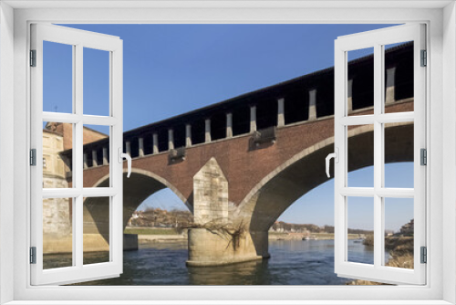 Fototapeta Naklejka Na Ścianę Okno 3D - Pavia, covered bridge over the river Ticino
