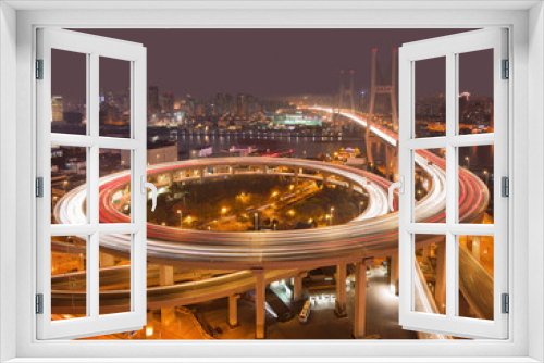 Fototapeta Naklejka Na Ścianę Okno 3D - Shanghai Nanpu bridge over the Huangpu river at night.