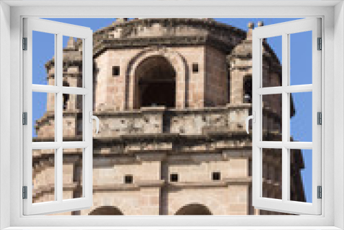 Tower and dome of the historic Iglesia de la Compania in  Cusco