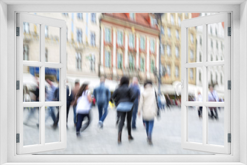 Fototapeta Naklejka Na Ścianę Okno 3D - Crowd of people walking on a city square in motion blur, zoom ef
