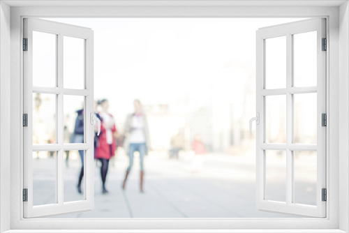 City commuters. High key blurred image of people walking in the