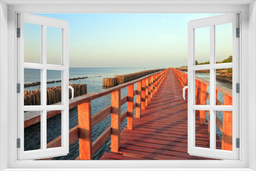Fototapeta Naklejka Na Ścianę Okno 3D - Wooden bridge to the sea