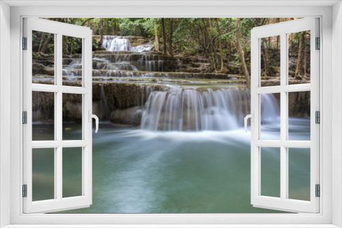Fototapeta Naklejka Na Ścianę Okno 3D - tropical waterfall in deep forest of Kanchanaburi province, Thailand.